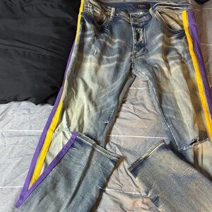 AMIRI Distressed Blue Jeans with Purple and Yellow Stripes